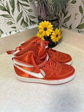 Nike Orange High-Top Sneakers with White Swoosh